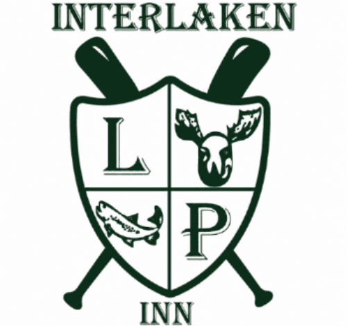 Logo of the Interlaken Inn featuring a shield with images of a moose, a fish, and the letters "L" and "P" with crossed paddles above.